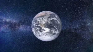 O reprezentare a planetei în cosmos ce ilustrează complexa mișcarea Pământului prin rotație și revoluție.